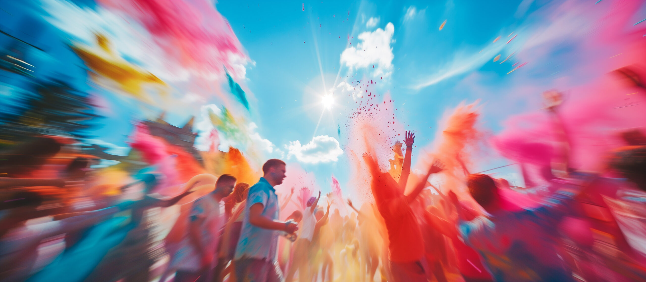 Festivalgäste feiern mit bunten Farben unter freiem Himmel – Fotobox Flensburg fängt emotionale Highlights solcher Events lebendig ein